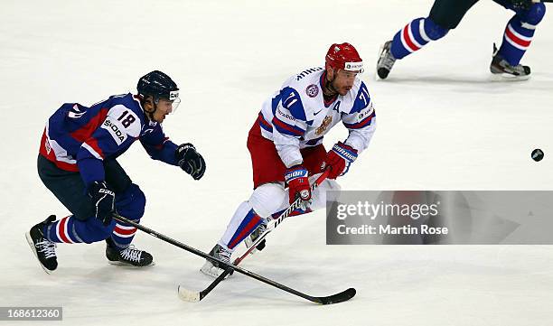 Miroslav Satan of Slovakia and Ilya Kovalchuk of Russia battle for the puck during the IIHF World Championship group H match between Slovakia and...