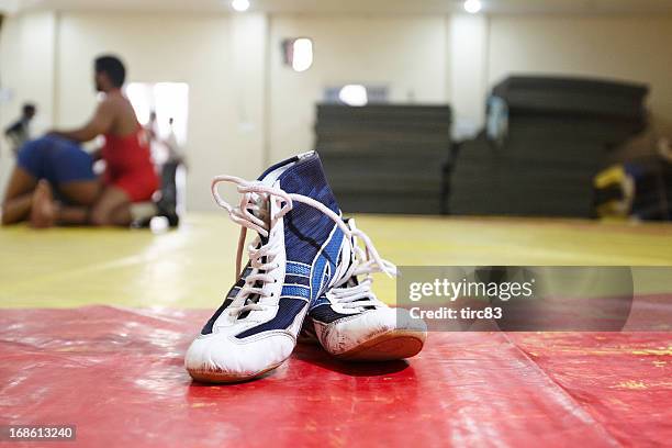 wrestling boots at the gym - wrestling stock pictures, royalty-free photos & images