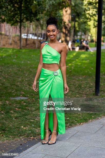 Leigh Anne Pinnock wears green skirt, asymmetric cropped top outside David Koma during London Fashion Week September 2023 at the on September 16,...