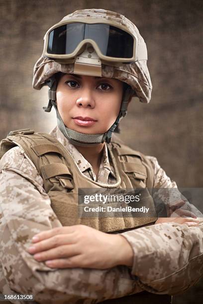 us marine female soldier in combat gear - army helmet stock pictures, royalty-free photos & images