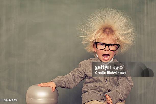 electric hair - awe stock pictures, royalty-free photos & images