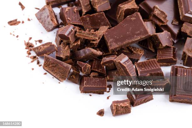 chocolate - chocolate chunks on white stock pictures, royalty-free photos & images