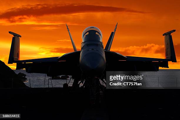 fighter plane at sunrise - us air force stock pictures, royalty-free photos & images