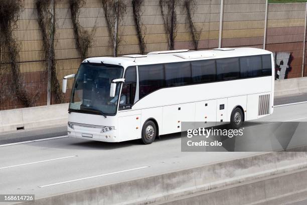 tour bus on german autobahn - tourist bus stock pictures, royalty-free photos & images