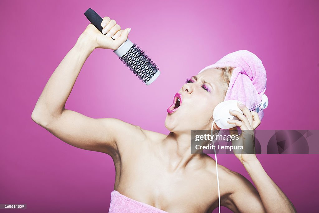 Humorous Singing in the Bathroom with a Hairbrush