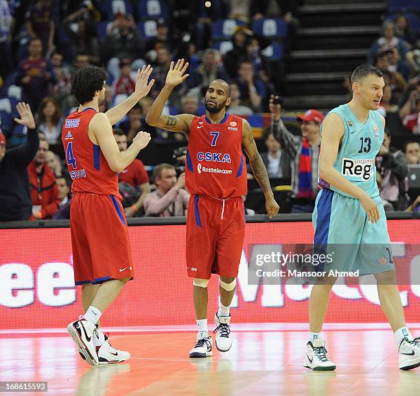 Aaron Jackson, #7 of CSKA Moscow high fives teammate Milos Teodosic, #4 as CSKA Moscow beat FC Barcelona Regal at the Turkish Airlines EuroLeague...