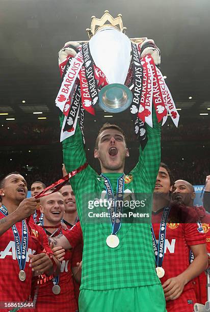 David de Gea of Manchester United lifts the Premier League trophy after the Barclays Premier League match between Manchester United and Swansea at...