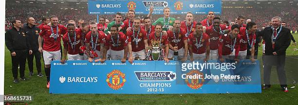 The Manchester United squad celebrates after the Barclays Premier League match between Manchester United and Swansea at Old Trafford on May 12, 2013...