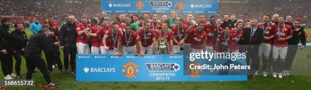 The Manchester United squad celebrates after the Barclays Premier League match between Manchester United and Swansea at Old Trafford on May 12, 2013...