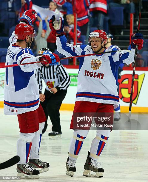 Denis Denisov of Russia celebrate with team mate Ilya Kovalchuk after he scores his team's 3rd goal during the IIHF World Championship group H match...