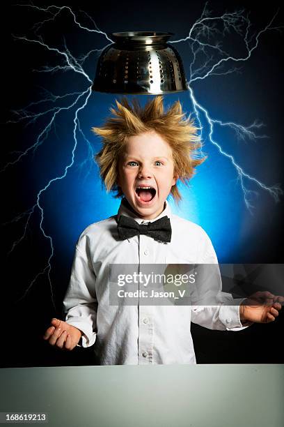 child scientist electrocuted - hair standing on end stock pictures, royalty-free photos & images