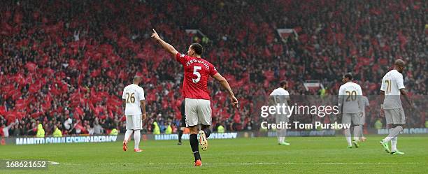 Rio Ferdinand of Manchester United celebrates scoring their second goal during the Barclays Premier League match between Manchester United and...