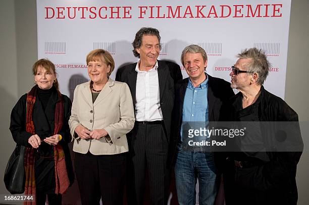 Angelica Domroese, German Chancellor Angela Merkel, Winfried Glatzeder, Andreas Dresen and Hilmar Thate attend the screening of the 1973 film "Die...