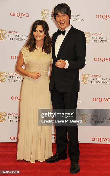 Jenna Louise Coleman and Professor Brian Cox pose in the press room at the Arqiva British Academy Television Awards 2013 at the Royal Festival Hall...