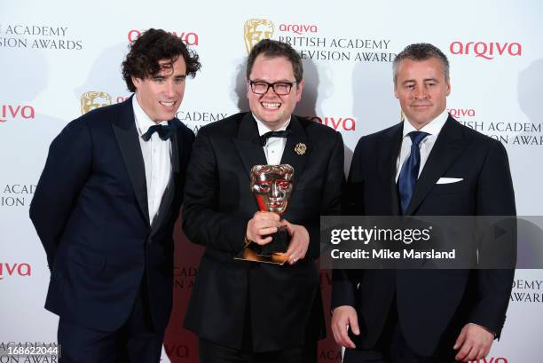 Alan Carr with his Best Entertainment Performance award with presenters Stephen Mangan and Matt LeBlanc during the Arqiva British Academy Television...