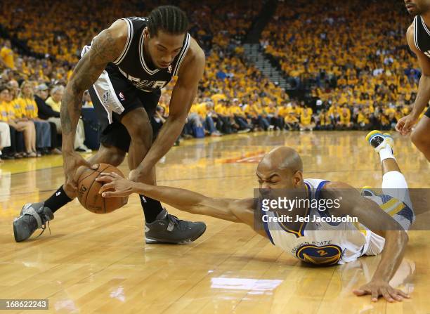 Jarrett Jack of the Golden State Warriors battles with Kawhi Leonard of the San Antonio Spurs in Game Four of the Western Conference Semifinals...