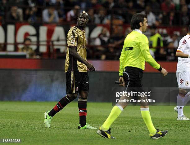 Mario Balotelli of AC Milan looks towards AS Roma fans during the Serie A match between AC Milan and AS Roma at San Siro Stadium on May 12, 2013 in...