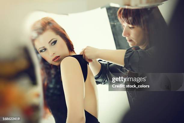 dressing up - fashion backstage stock pictures, royalty-free photos & images