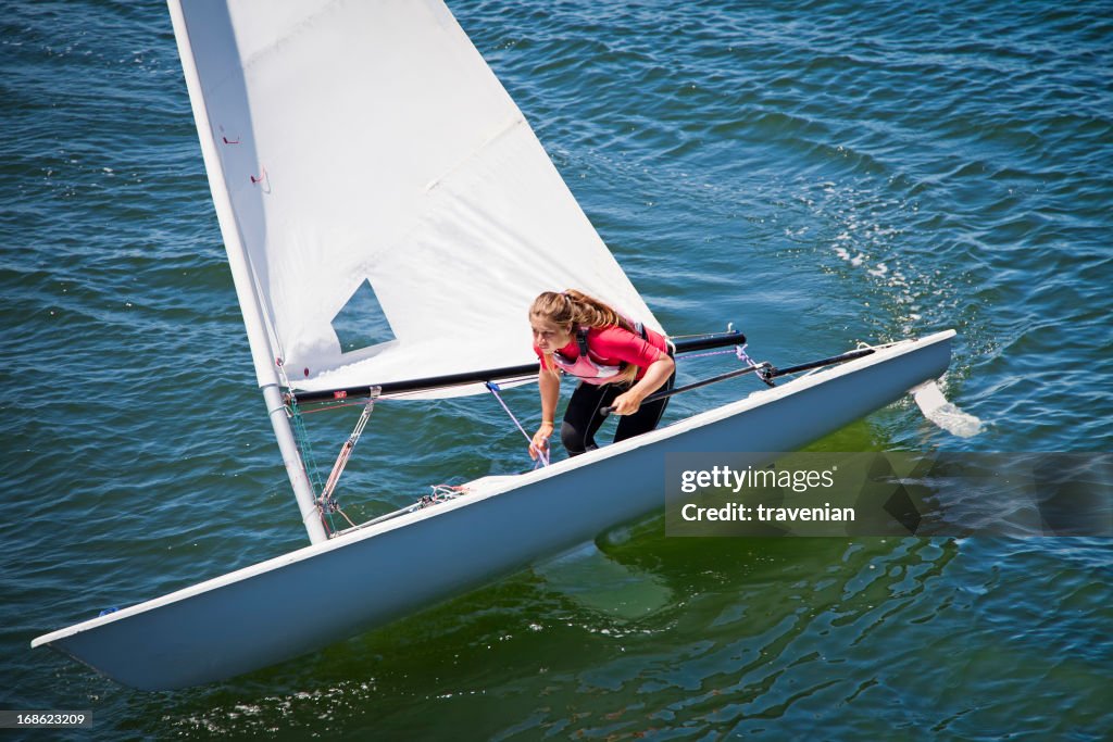 Girl sailing dinghy
