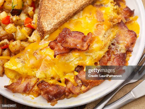 the ultimate bacon and cheddar cheese omelette - frittata stock pictures, royalty-free photos & images