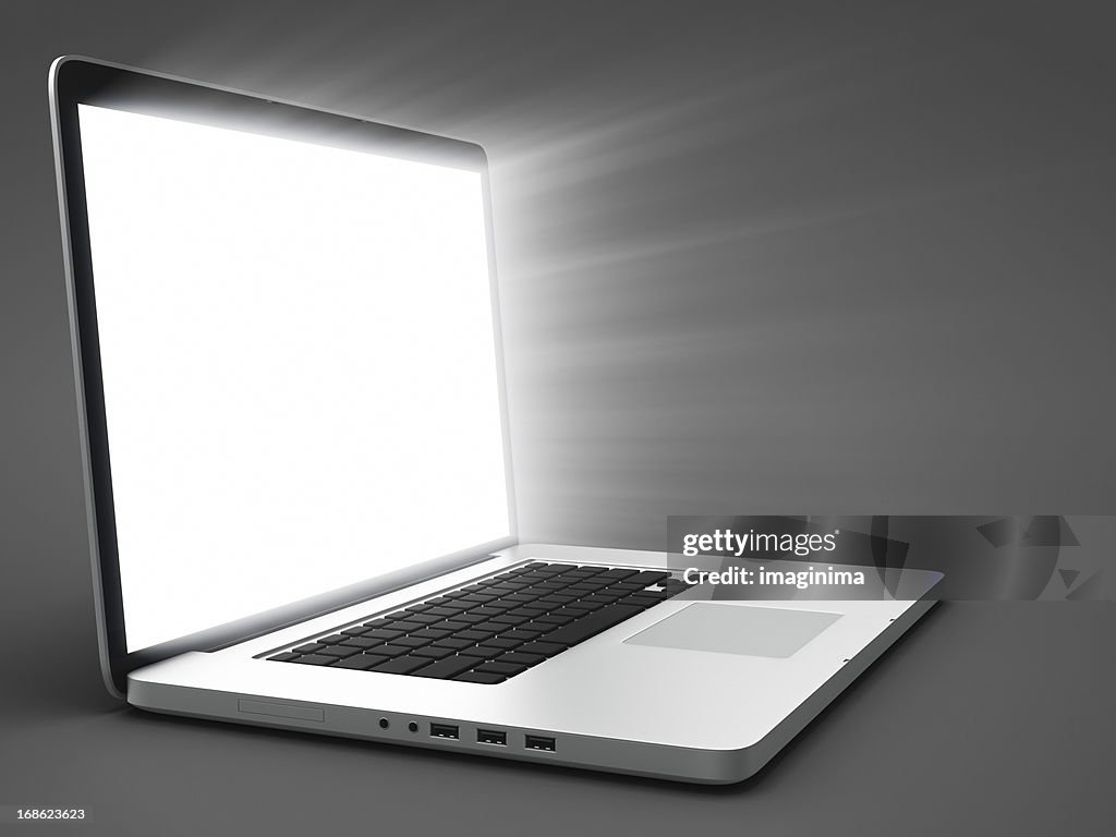 Open Laptop with Light Rays