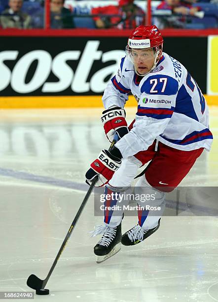 Alexei Tereshenko of Russia skates with the puck during the IIHF World Championship group H match between Slovakia and Russia at Hartwall Areena on...