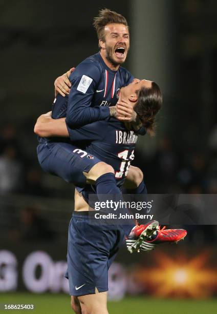 David Beckham and Zlatan Ibrahimovic of PSG celebrate the french Ligue 1 title of PSG after the Ligue 1 match between Olympique Lyonnais, OL, and...