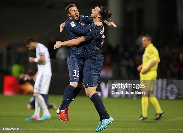 David Beckham and Zlatan Ibrahimovic of PSG celebrate the french Ligue 1 title of PSG after the Ligue 1 match between Olympique Lyonnais, OL, and...