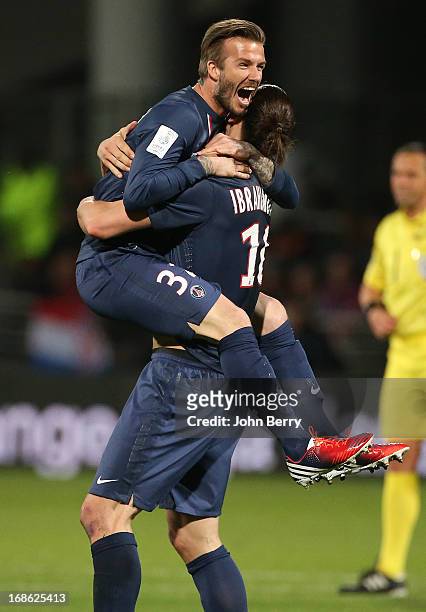 David Beckham and Zlatan Ibrahimovic of PSG celebrate the french Ligue 1 title of PSG after the Ligue 1 match between Olympique Lyonnais, OL, and...