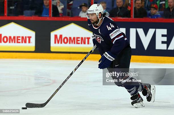 Nate Thompson of USA skates with the puck during the IIHF World Championship group H match between USA and Germany at Hartwall Areena on May 12, 2013...