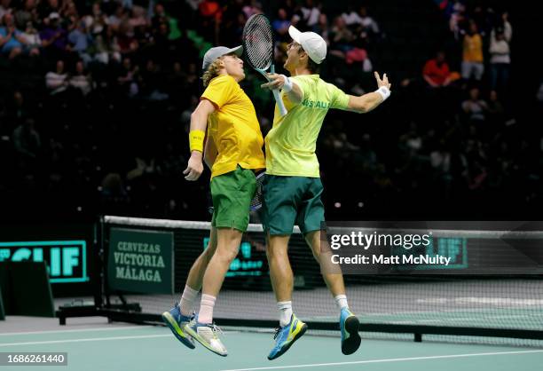 Max Purcell of Team Australia celebrates with Matthew Ebdenafter defeating Team Switzerland during the Davis Cup Finals Group Stage at AO Arena on...