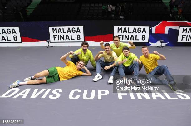 Players and coaches of Team Australia pose for a picture after qualifying for the Final 8 of the Davis Cup during the Davis Cup Finals Group Stage at...