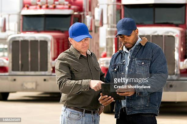 tablet computer review - trucking industry stock pictures, royalty-free photos & images