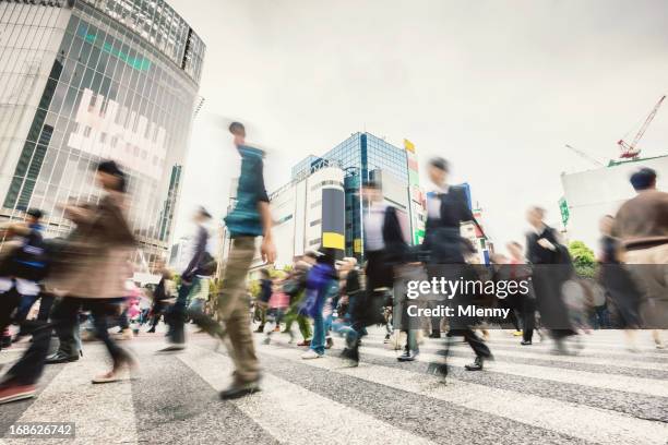 通勤者、日本東京渋谷スクランブル交差点 - huddle ストックフォトと画像