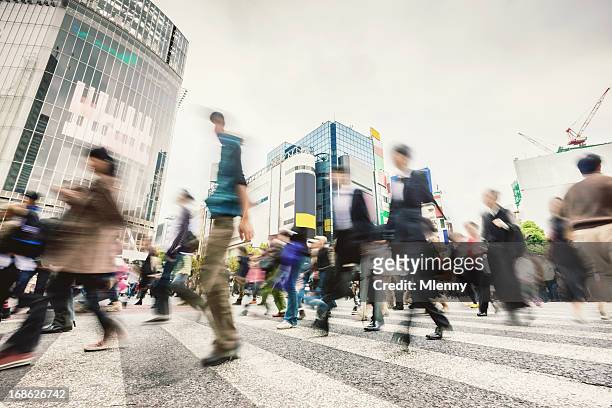 commuters shibuya crossing,tokyo japan - shibuya crossing stock pictures, royalty-free photos & images