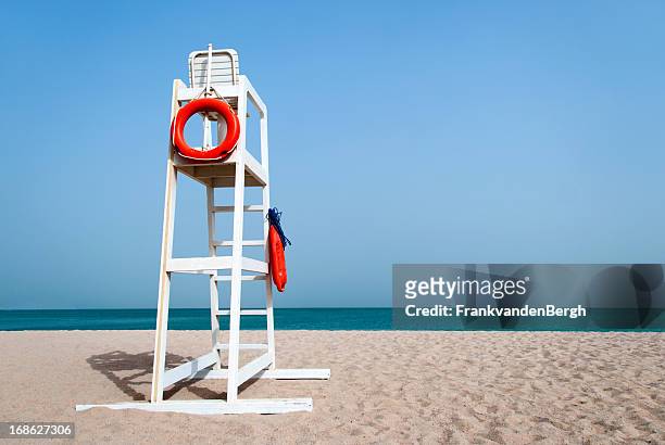 lifeguard chair - beach lifeguard stock pictures, royalty-free photos & images