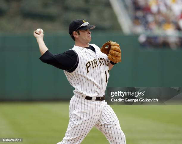 Third baseman Freddy Sanchez of the Pittsburgh Pirates throws the ball to first base during a game against the Colorado Rockies at PNC Park on July...