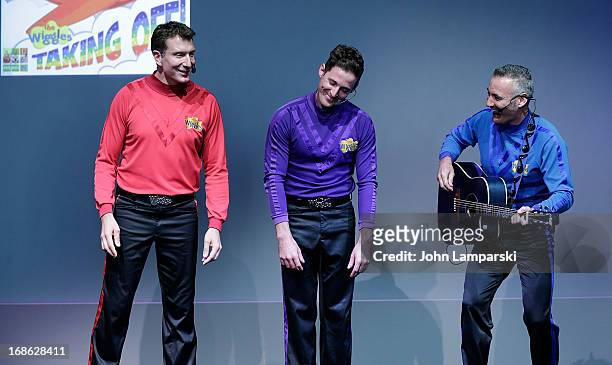 Simon Pryce, Lachlan Gillespie and Anthony Field of the Wiggles perform at the Apple Store Soho on May 12, 2013 in New York City.