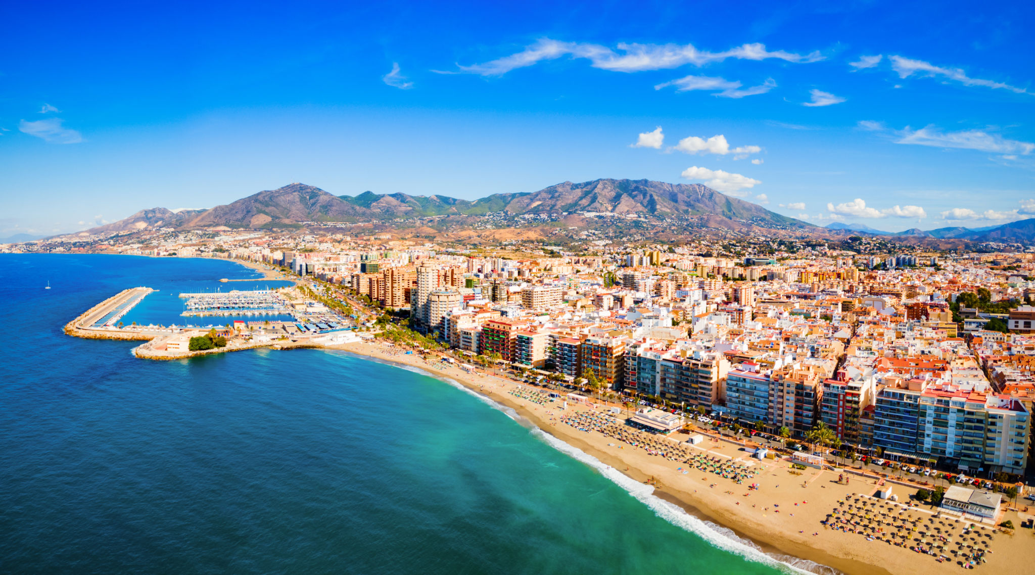 Fuengirola city beach and port aerial panoramic view in Costa del Sol, Spain Fuengirola city beach and port aerial panoramic view in Costa del Sol, Spain