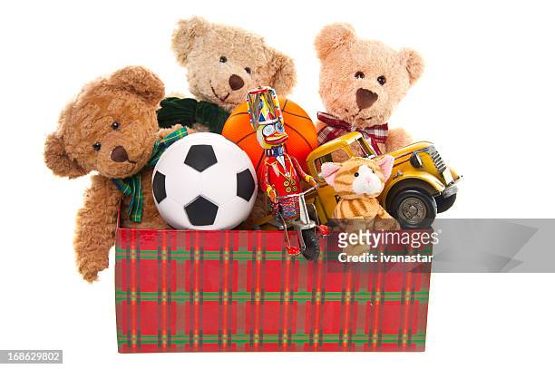 donation box with teddy bear, balls and toys - donation box white background stock pictures, royalty-free photos & images