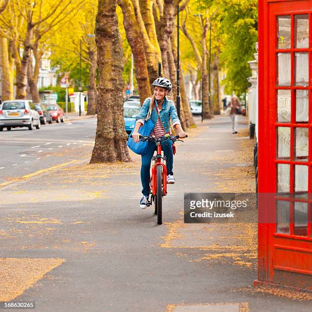 cute girl in london - london bikes stock pictures, royalty-free photos & images