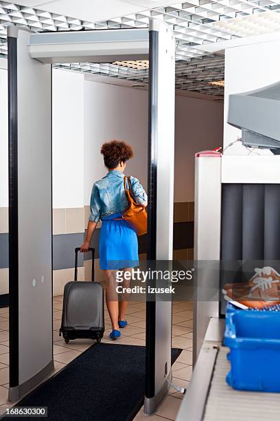 at the airport security checkpoint - border control stock pictures, royalty-free photos & images