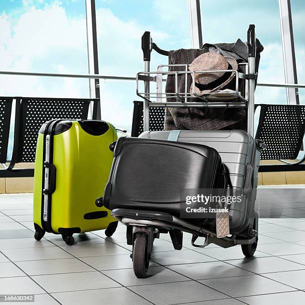 luggage trolley with suitcases - cartgate out stock pictures, royalty-free photos & images