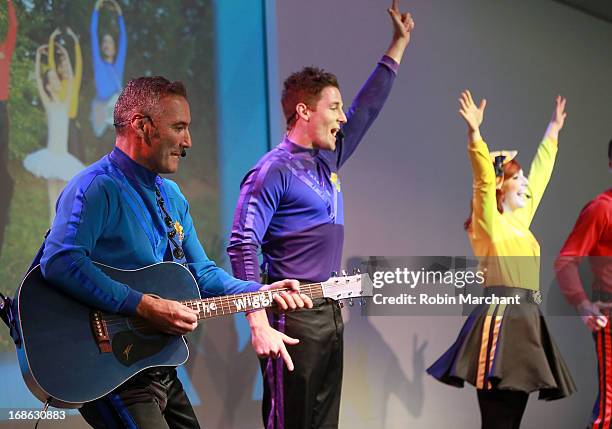 Anthony Field, Lachlan Gillespie and Emma Watkins of The Wiggles perform at Apple Store Soho on May 12, 2013 in New York City.