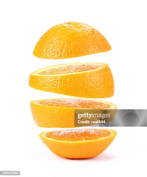 suspended orange - cutting fruit stock pictures, royalty-free photos & images