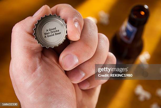 beer bottle cap message - flaskkapsyl bildbanksfoton och bilder