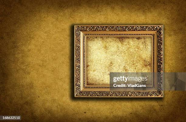 wallpaper with empty picture frame - antique frame wall stock pictures, royalty-free photos & images