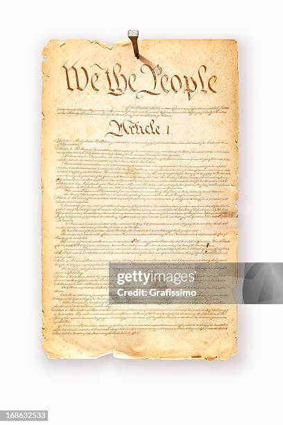 constitution usa fixed with nail on white background - constitution stock pictures, royalty-free photos & images