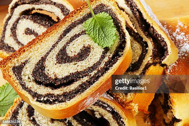 poppy swiss roll slices - poppy seed stock pictures, royalty-free photos & images