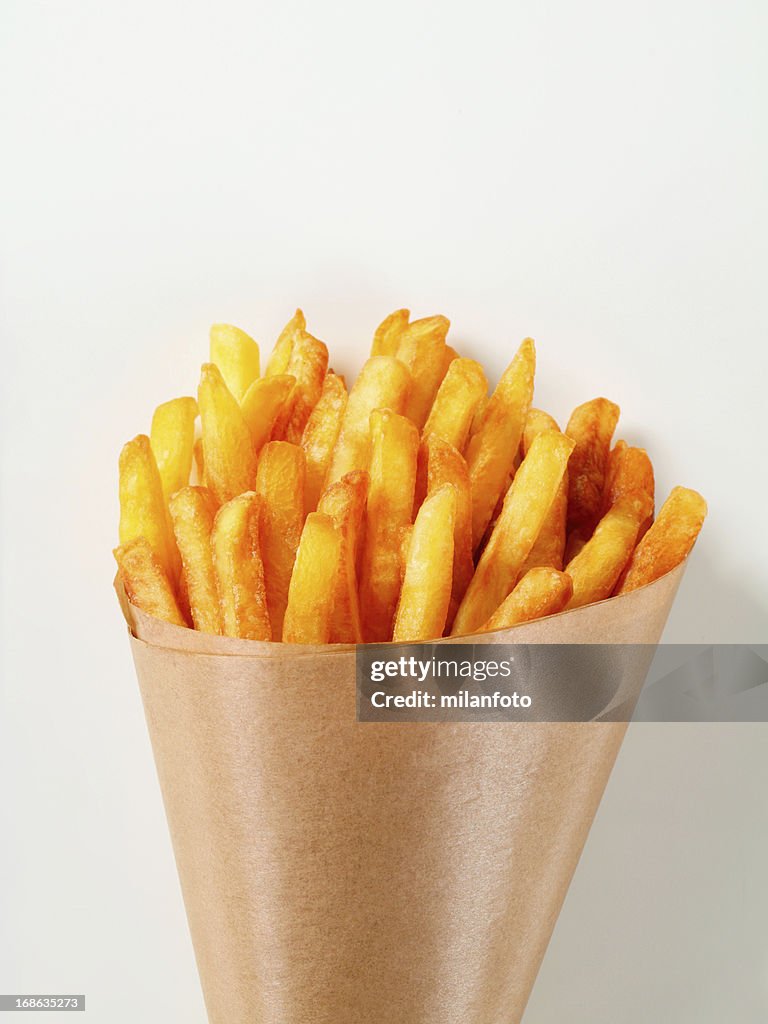 French Fries In A Paper Cone High-Res Stock Photo - Getty Images